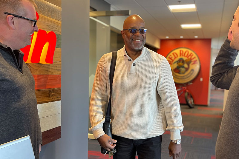 Team Members huddling at support center
