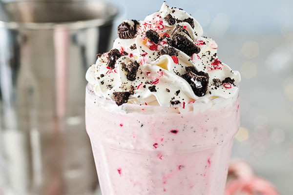 candy cane and oreo milkshake with refill tin