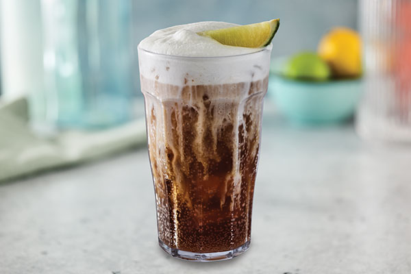 Kids Coconut Coca-Cola Fizzy Soda with cold foam