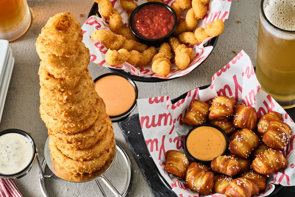 Towering Onion Rings, Mozzarella Twists, Pretzel Bites with Beer Cheese
